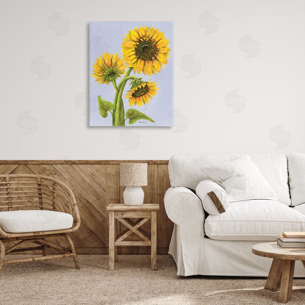 Patti Bishop Sunflower Trio Against Blue Canvas Art on Wall