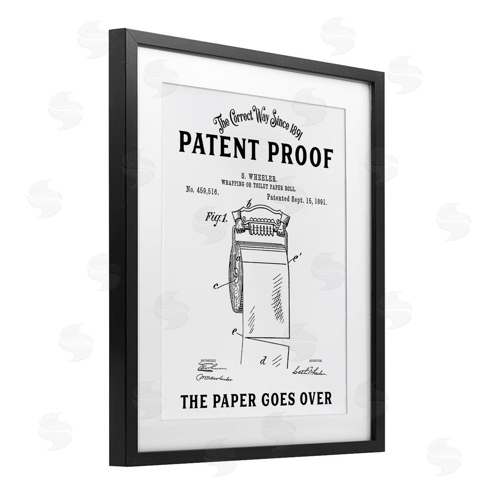 Lettered and Lined Toilet Paper Goes Over Black Framed Print Under Glass Wall Art