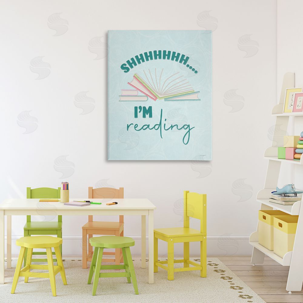 Seven Trees Design Shhh I'm Reading Stretched Canvas Wall Art in Room