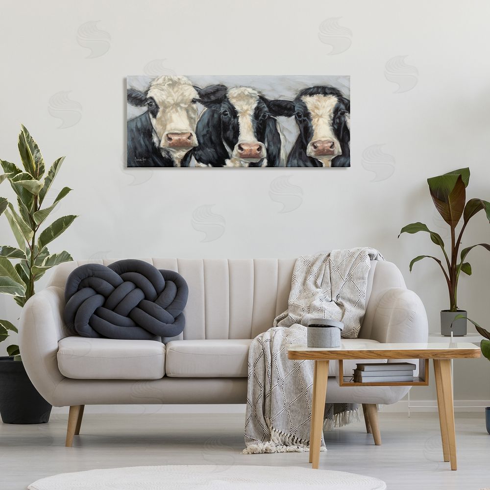 Sara G. Designs Ink & Ivory Cow Trio Canvas Wall Art Print in Room
