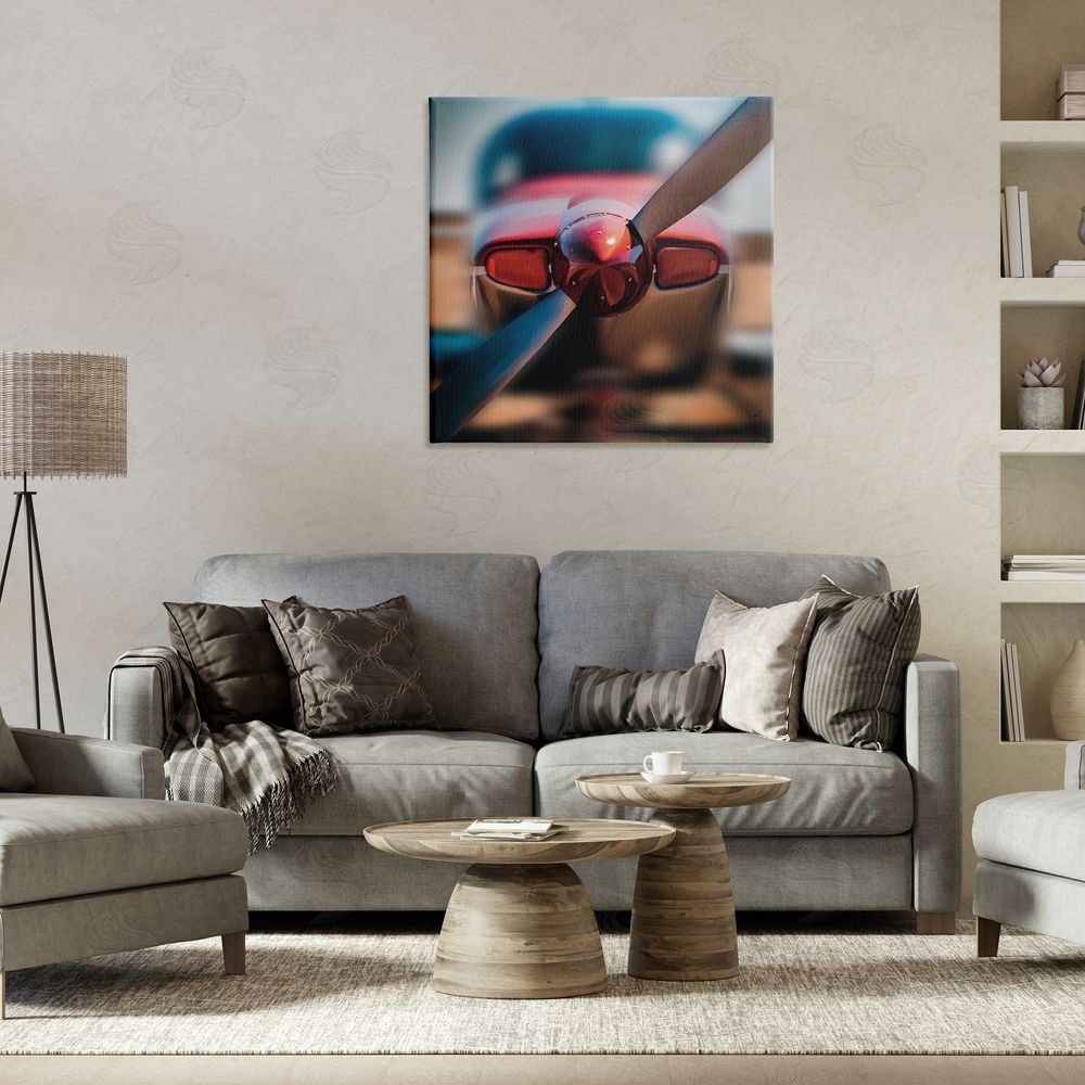 Renel Peters Red Aircraft Propeller Stretched Canvas Wall Art in Room