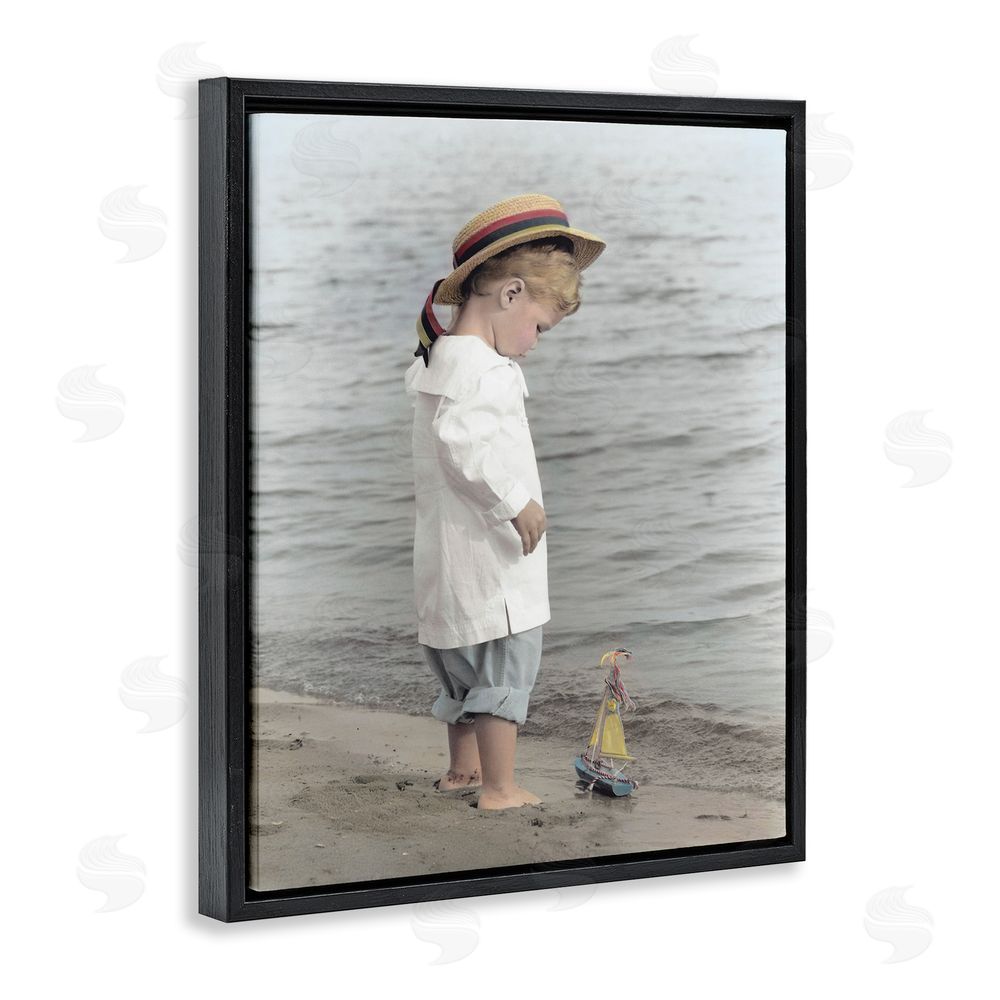 Kendra Dew Child on Beach Shore Black Floating Frame Canvas Wall Art Print