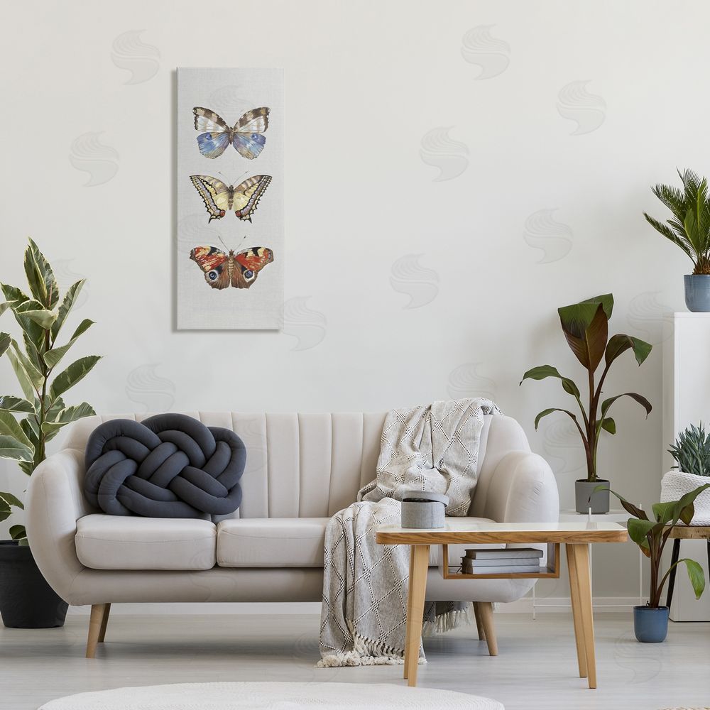 Maya Woods Butterfly Trio Symmetry Stretched Canvas Wall Art in Room