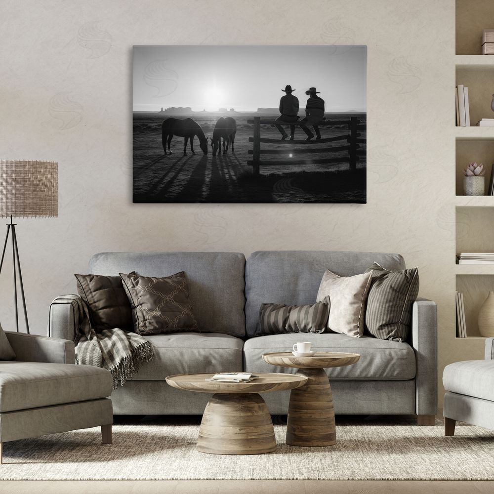 A Barefoot Stylist After The Ride Cowboy Silhouettes Stretched Canvas Wall Art in Room