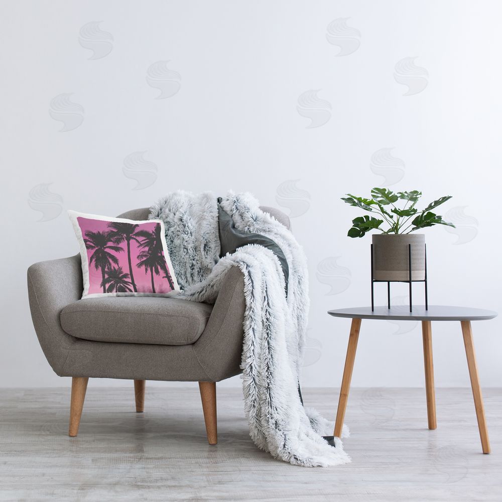 Mia Jensen Pink & Black Palms Printed Plush Polyester Throw Pillow On Chair