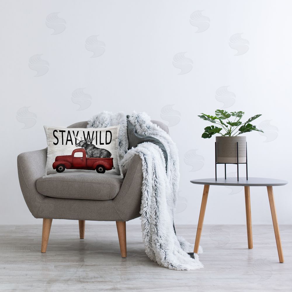 Lettered and Lined Stay Wild Moose Printed Plush Polyester Throw Pillow On Chair