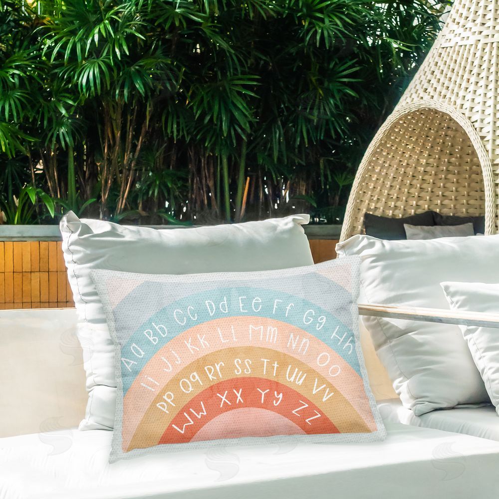 Stupell Studio Soft Rainbow Alphabet Outdoor Quick-Dry Polyester Printed Throw Pillow in Back Yard