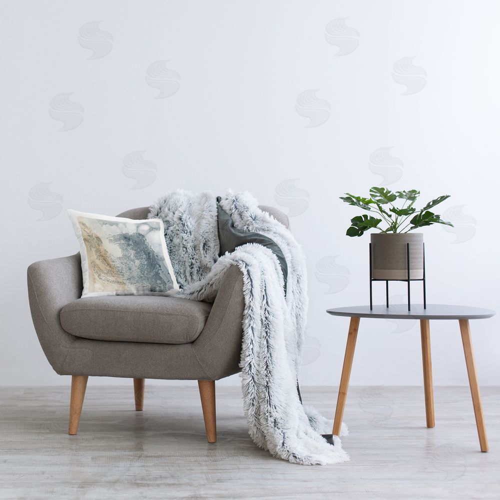 Ethan Harper Grey & Beige Abstract Printed Plush Polyester Throw Pillow On Chair