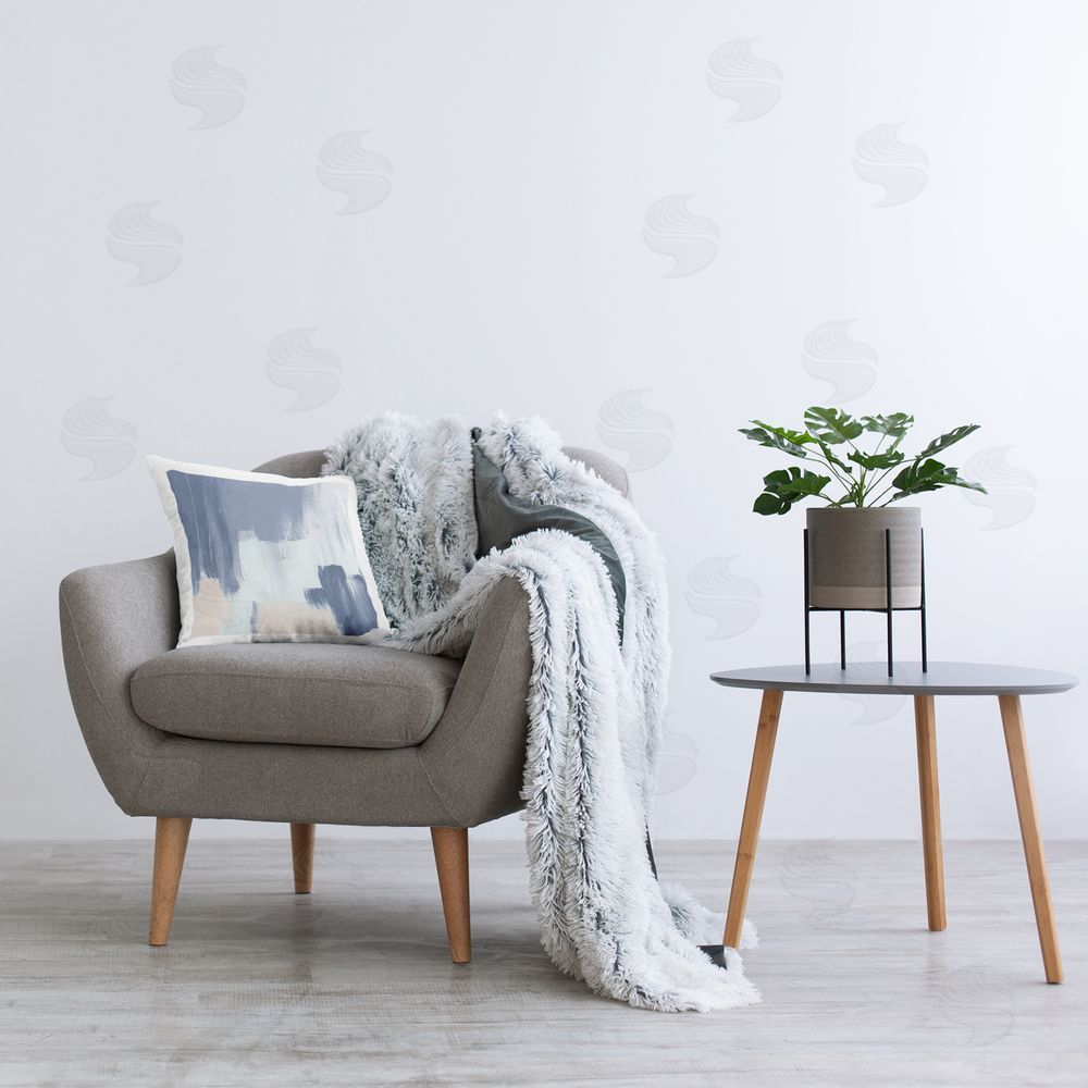 Lucille Price Blue & Tan Abstraction Printed Plush Polyester Throw Pillow On Chair