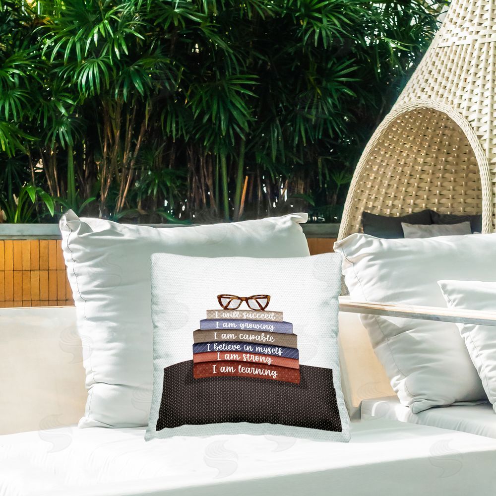Saba Rauf Inspirational Bookstack Phrases Outdoor Quick-Dry Polyester Printed Throw Pillow in Back Yard
