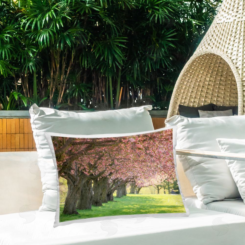 Carrie Ann Grippo-Pike Sunlit Blossoming Trees Outdoor Quick-Dry Polyester Printed Throw Pillow in Back Yard