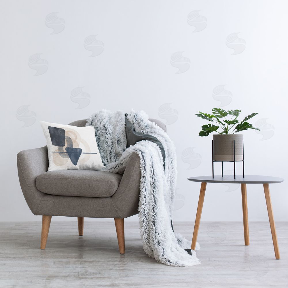 Amber Sterling Various Shapes Layered Printed Plush Polyester Throw Pillow On Chair