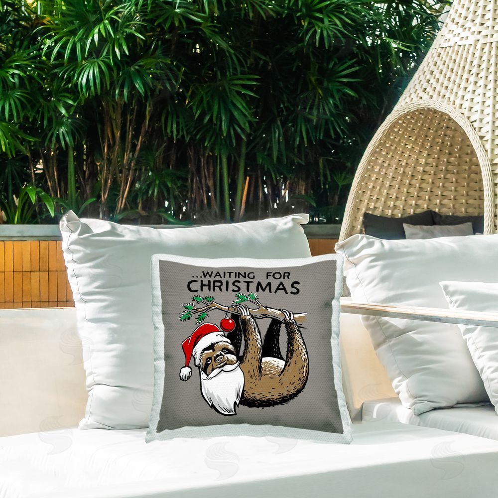 Jedco Brands Inc. Santa Christmas Sloth Outdoor Quick-Dry Polyester Printed Throw Pillow in Back Yard