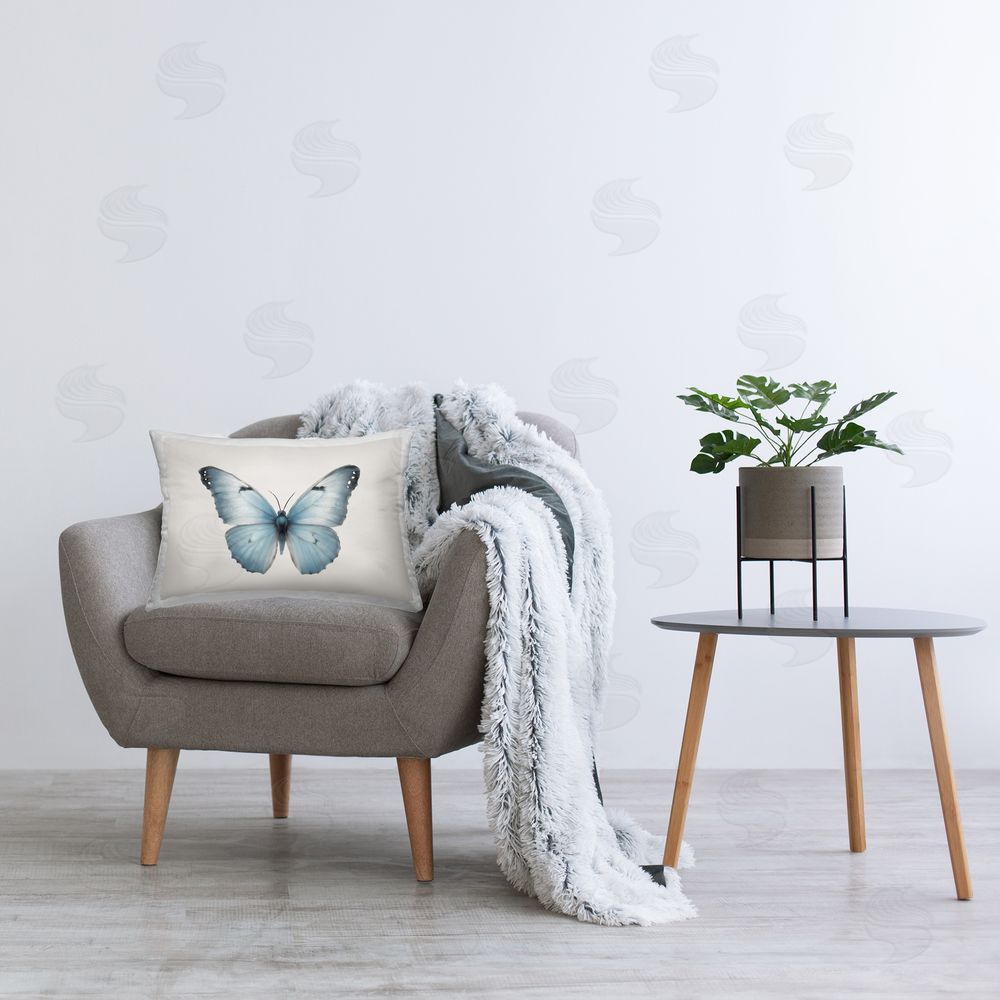Elizabeth Medley Blue Symmetrical Butterfly Printed Plush Polyester Throw Pillow On Chair