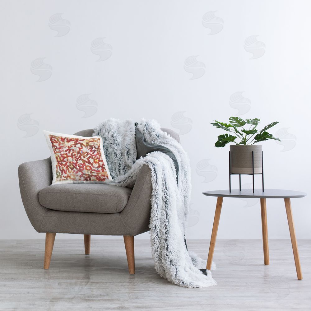 Laura Gibson Red Typography Collage Printed Plush Polyester Throw Pillow On Chair