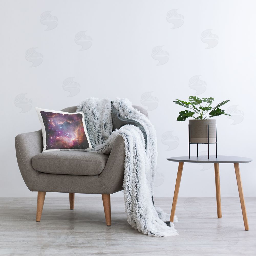 Wild Apple Portfolio Cloud Galaxy with Stars Printed Plush Polyester Throw Pillow On Chair