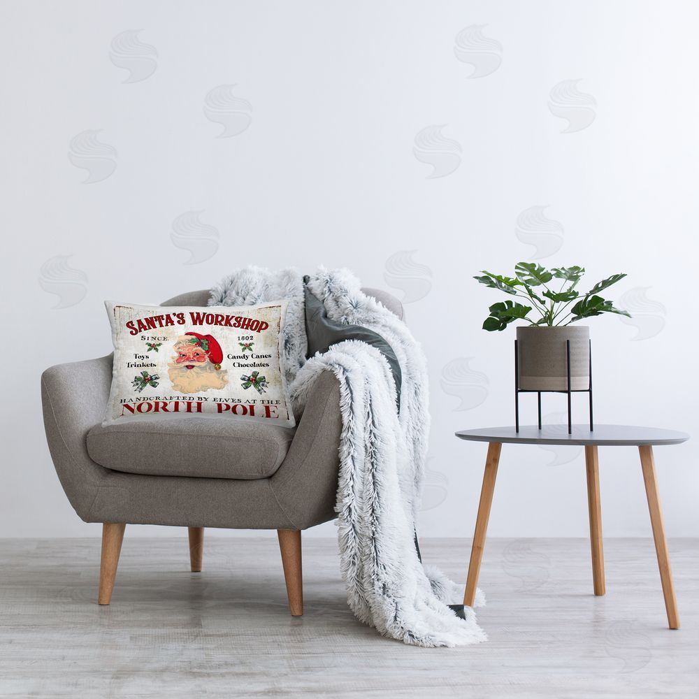 Creatif Belle North Pole Santa's Workshop Printed Plush Polyester Throw Pillow On Chair
