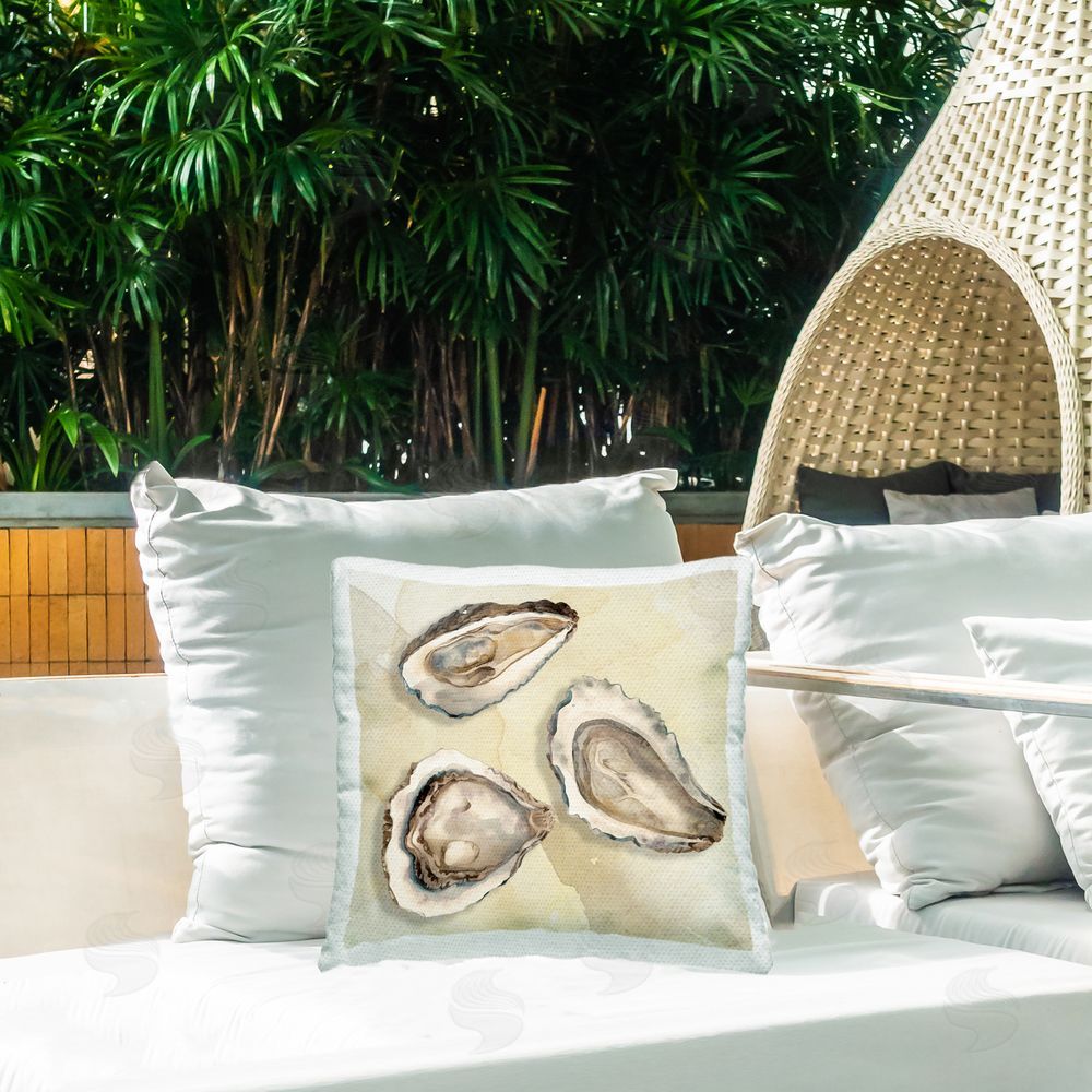 CAD Designs Beige Oyster Trio Outdoor Square Pillow on Patio