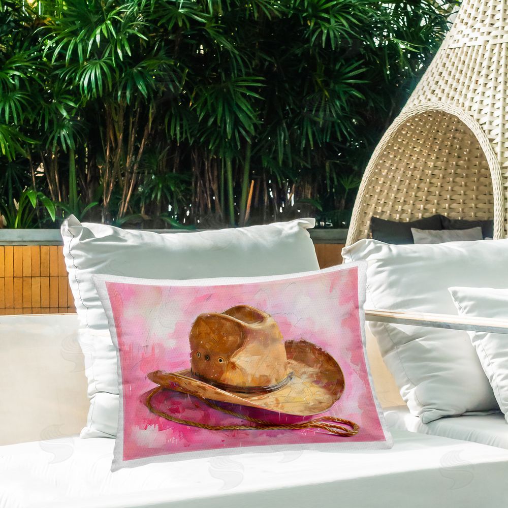 LSR Design Studio Cowgirl Hat over Pink Outdoor Printed Throw Pillow on Patio