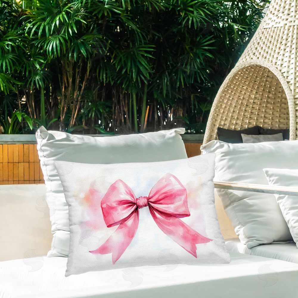 Creative Studio Watercolor Fade Pink Bow Outdoor Printed Throw Pillow on Patio