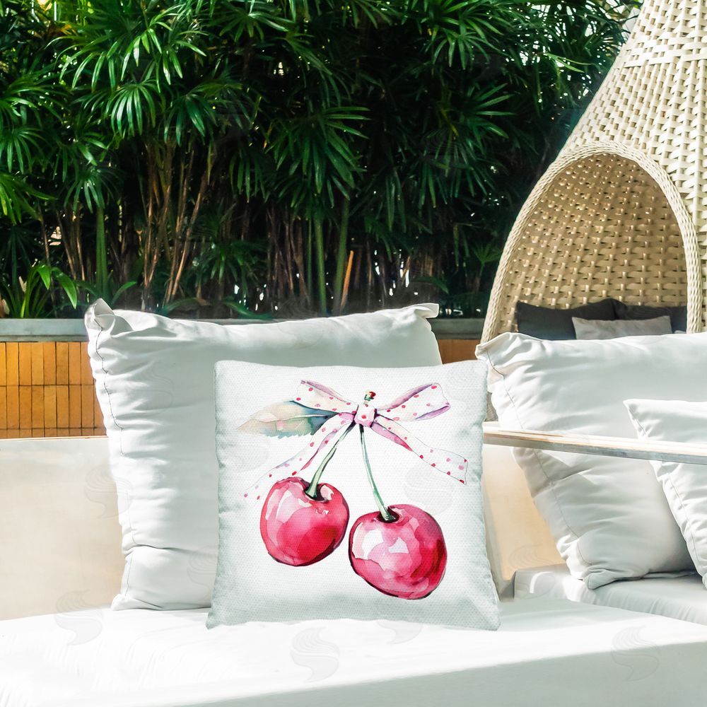 Creative Studio Whimsical Cherries with Dotted Ribbon Outdoor Printed Throw Pillow on Patio