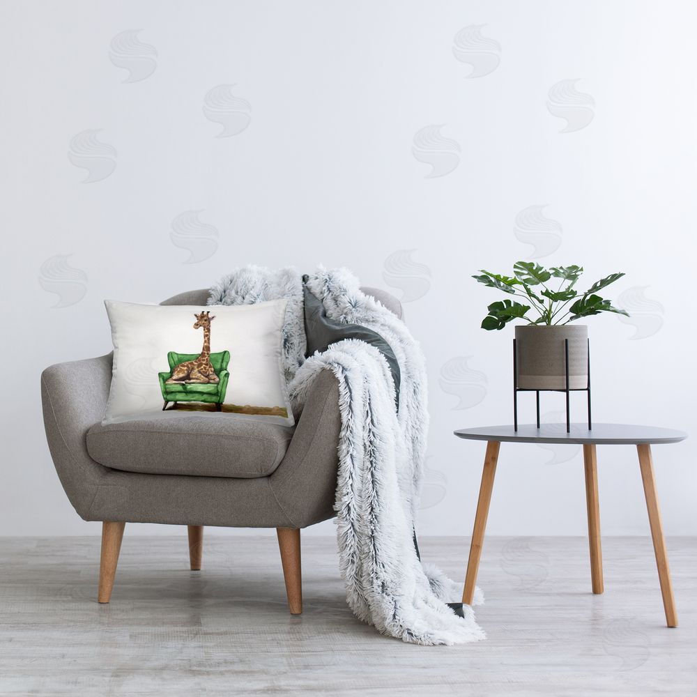 George Dyachenko Cute Giraffe on Green Chair Printed Indoor Throw Pillow in Room