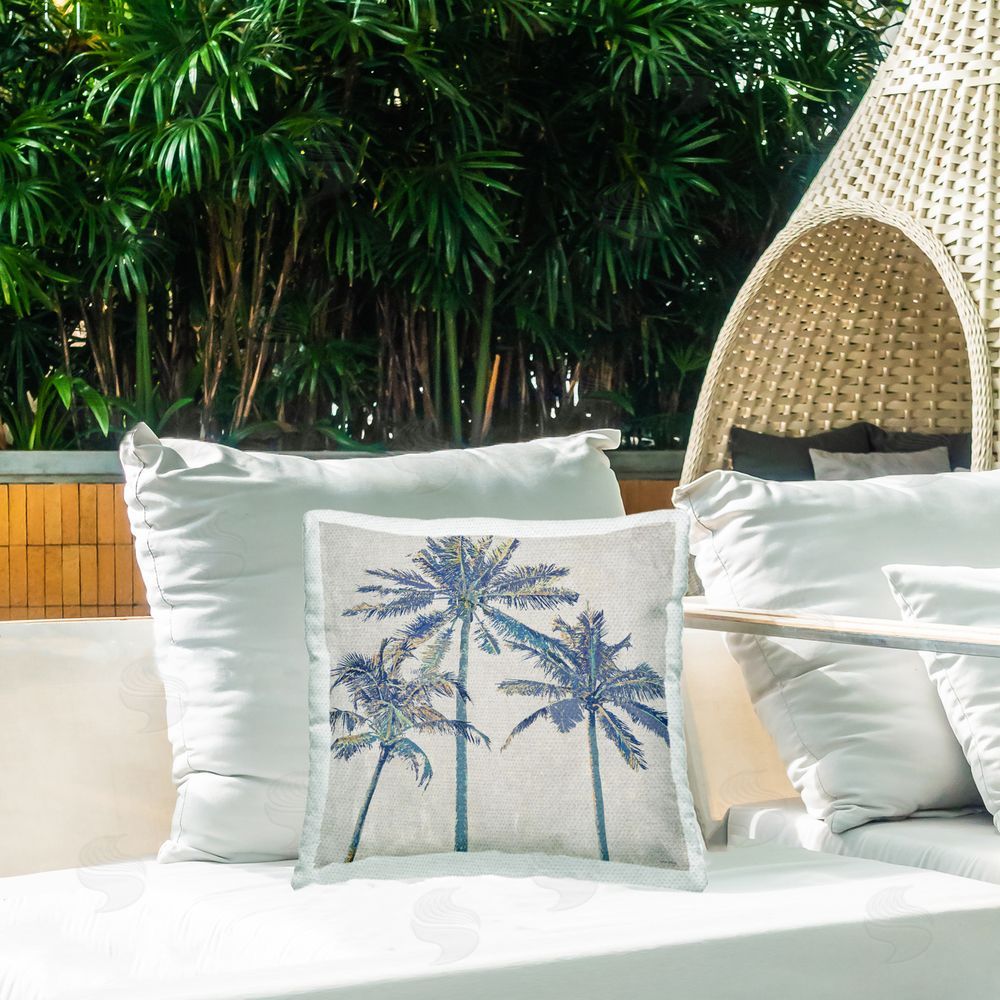 Amber Sterling Exotic Pop Blue Palms Outdoor Printed Throw Pillow on Patio