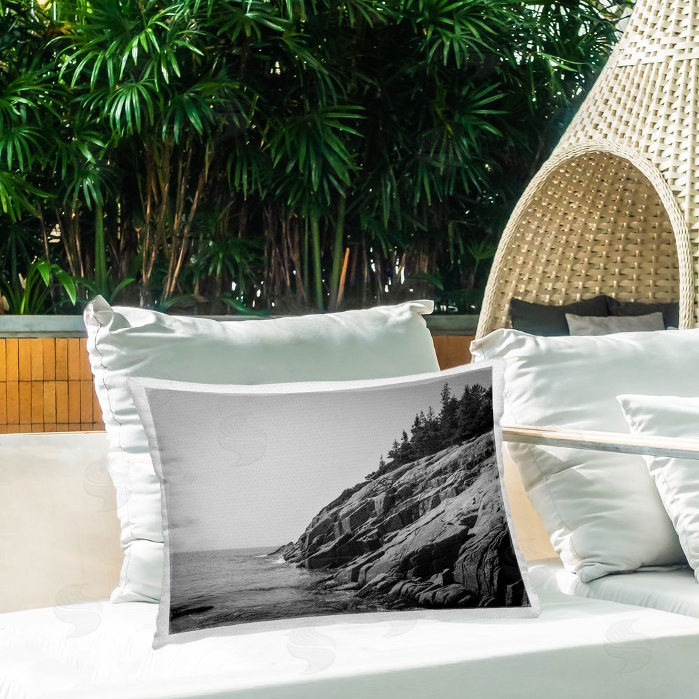 James Rodewald Steep Ocean Cliff Side Outdoor Printed Throw Pillow on Patio