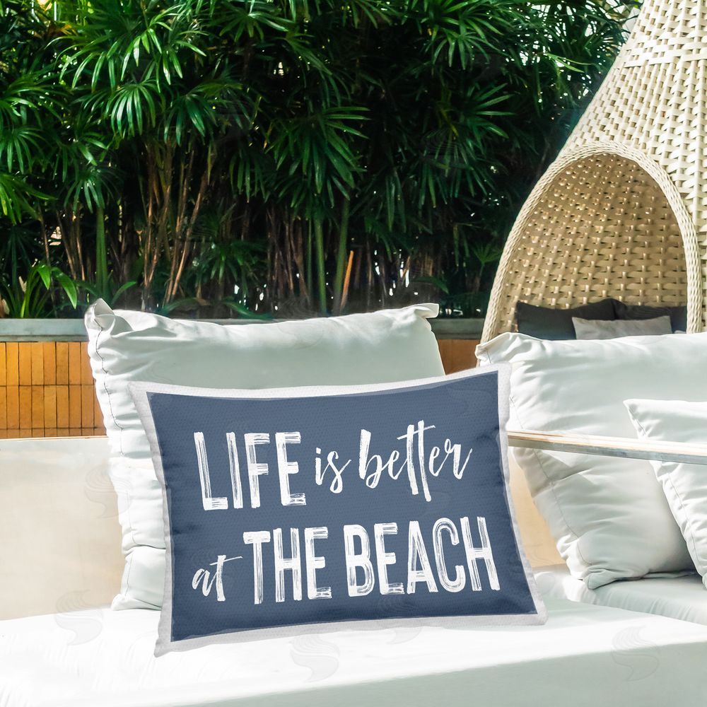 Lettered and Lined Life Better At Beach Blue Outdoor Rectugular Printed Throw Pillow on Patio