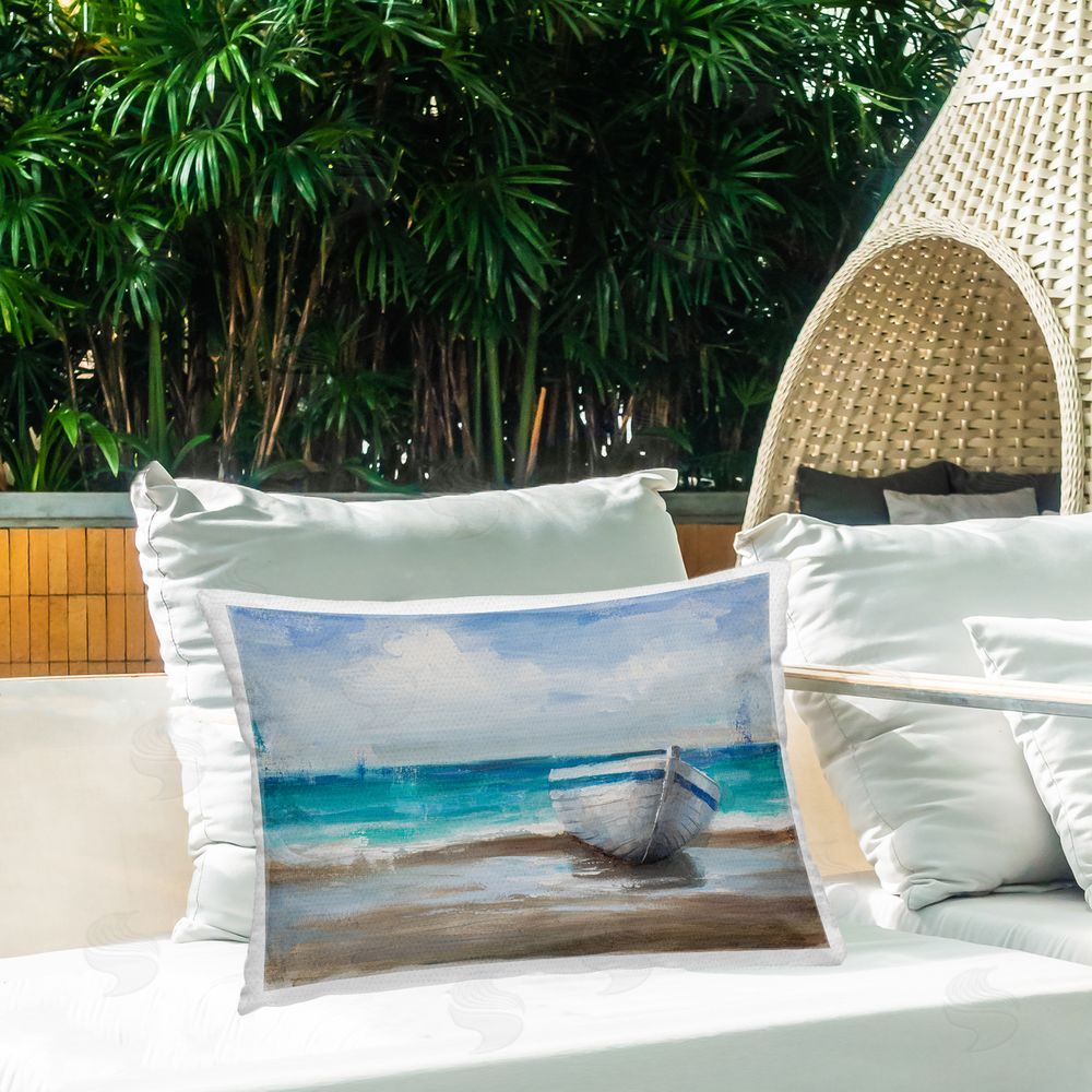 Cloverfield & Co. Painterly Boat On The Shore Printed Throw Pillow on Patio