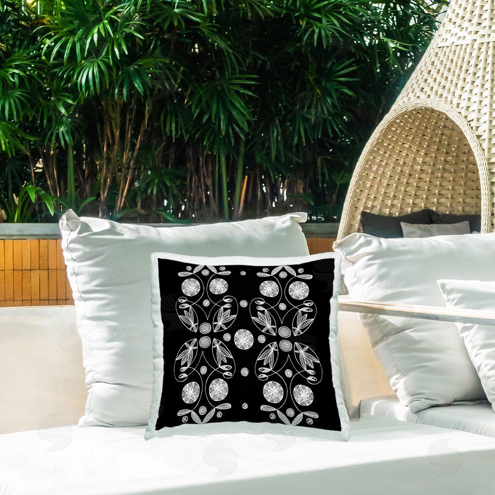 El Perkin Symmetrical Flower-Like Patterns Outdoor Printed Throw Pillow on Patio