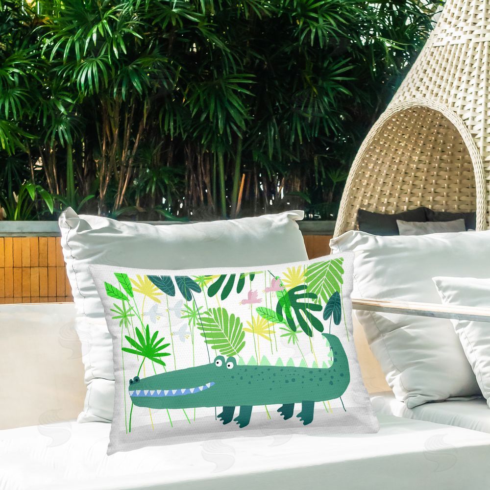 Carla Daly Crocodile Jungle & Leaves Printed Throw Pillow on Patio