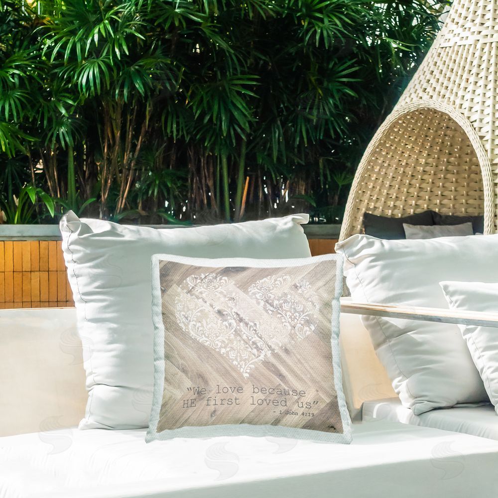 Elizabeth Medley He Loved Us First Outdoor Printed Throw Pillow on Patio