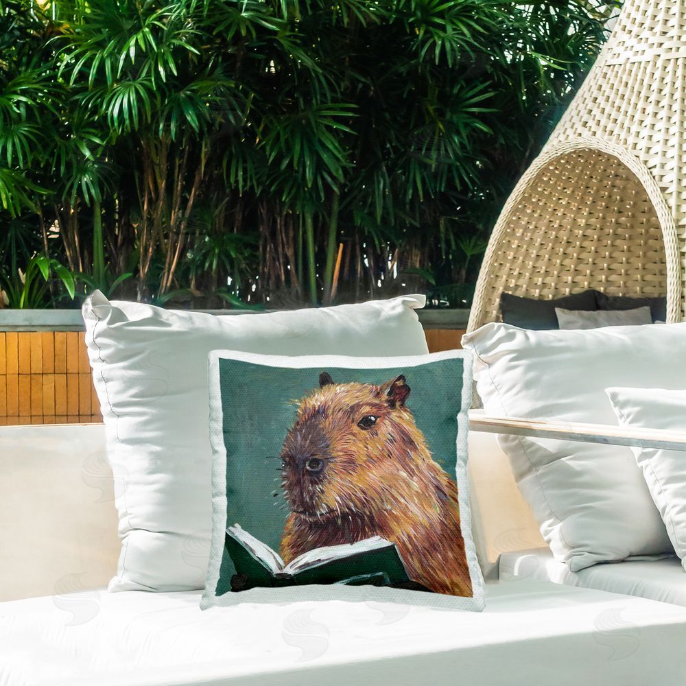 Studio Bautista Studious Capybara Reading Outdoor Printed Throw Pillow on Patio