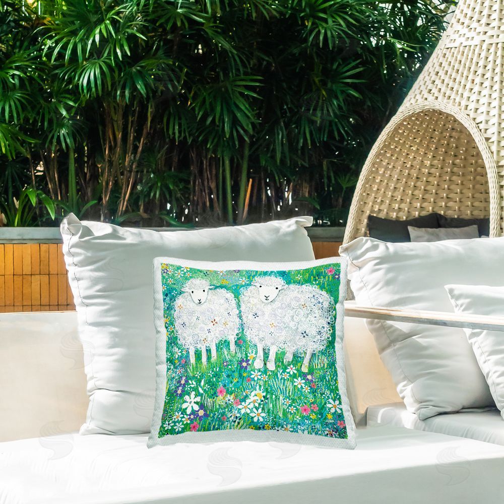 Clare Tupper Wooly Sheep with Scattered Flowers Outdoor Printed Throw Pillow on Patio