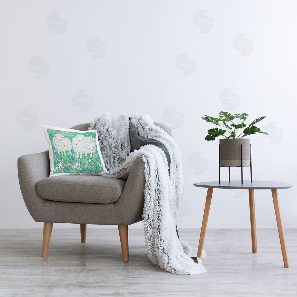 Clare Tupper Wooly Sheep with Scattered Flowers Printed Indoor Throw Pillow in Room