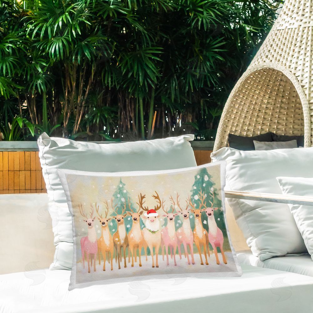 Arlington Prints Pastel Santa's Reindeer Outdoor Rectugular Printed Throw Pillow on Patio