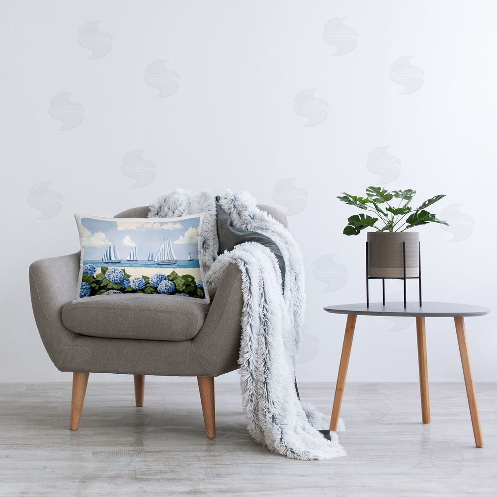 Sisi and Seb Striped Sails & Seaside Hydrangeas Printed Lumbar Throw Pillow on Seat