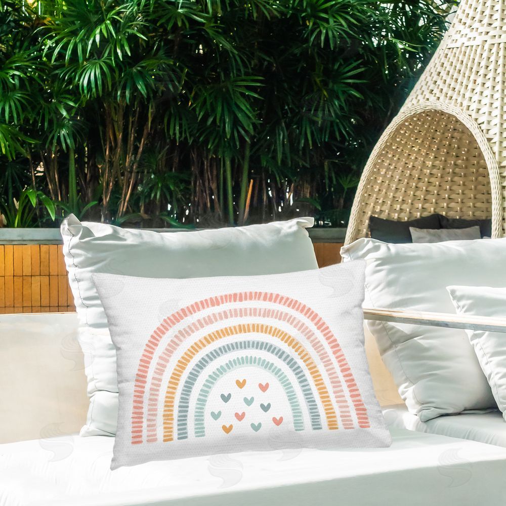 Stupell Studio Whimsical Pastel Rainbow with Hearts Outdoor Printed Lumbar Throw Pillow on Seat