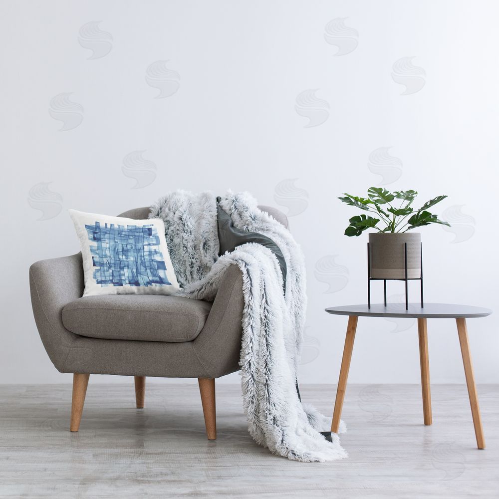 PI Studio Translucent Indigo Crosshatch Plush Polyester Printed Square Pillow on Chair