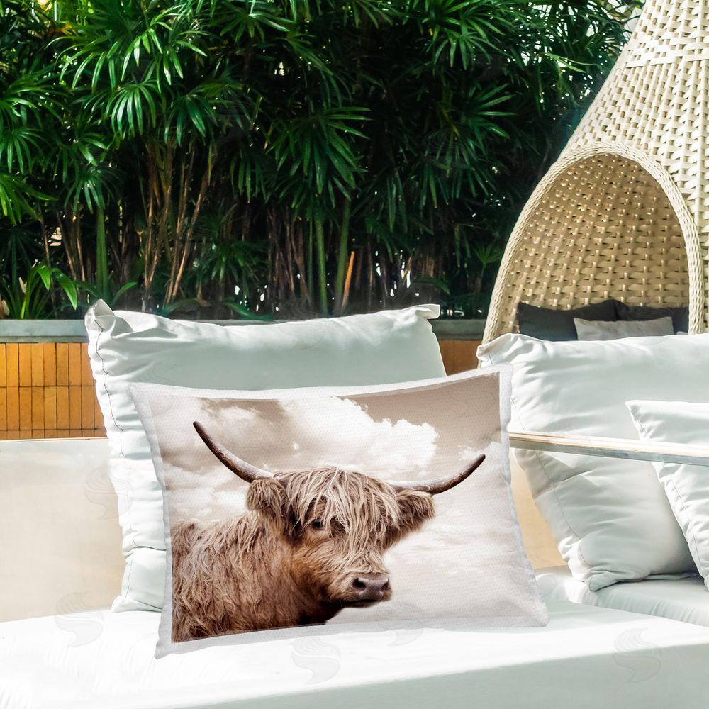 CAD Designs Shaggy Highland Cow & Clouds Outdoor Quick-Dry Polyester Printed Lumbar Pillow on Patio