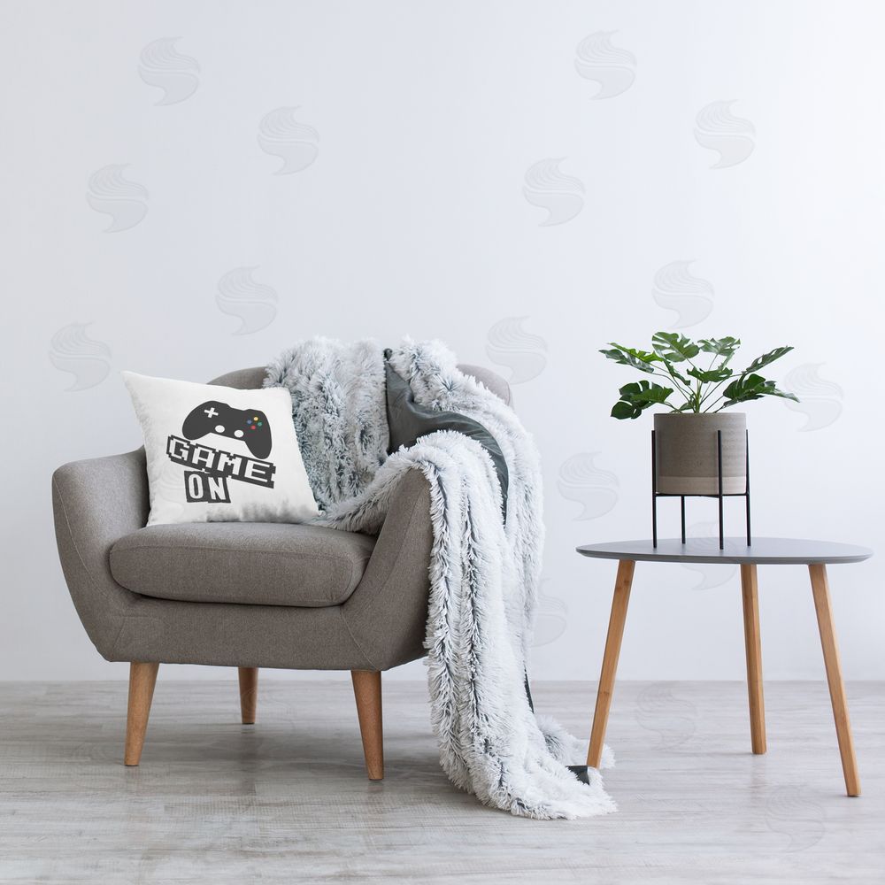 Marcus Prime Playful Game On Plush Polyester Printed Square Pillow on Chair