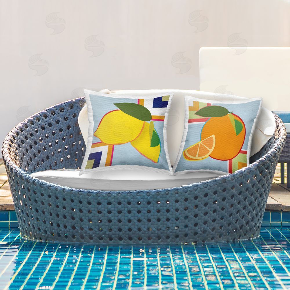 Daniela Santiago Geometric Citrus Fruit Outdoor Pillow Set on Patio